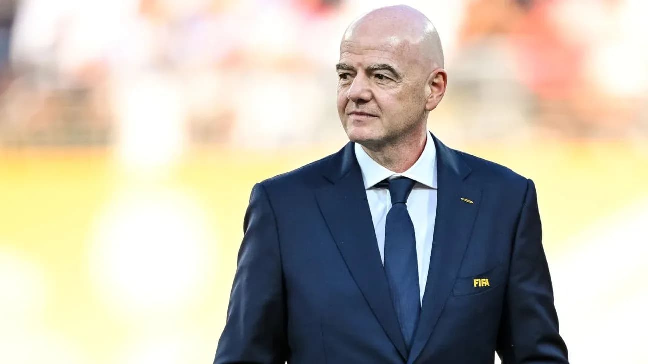 FIFA president walking on the pitch before match FIFA president walking on the pitch before match