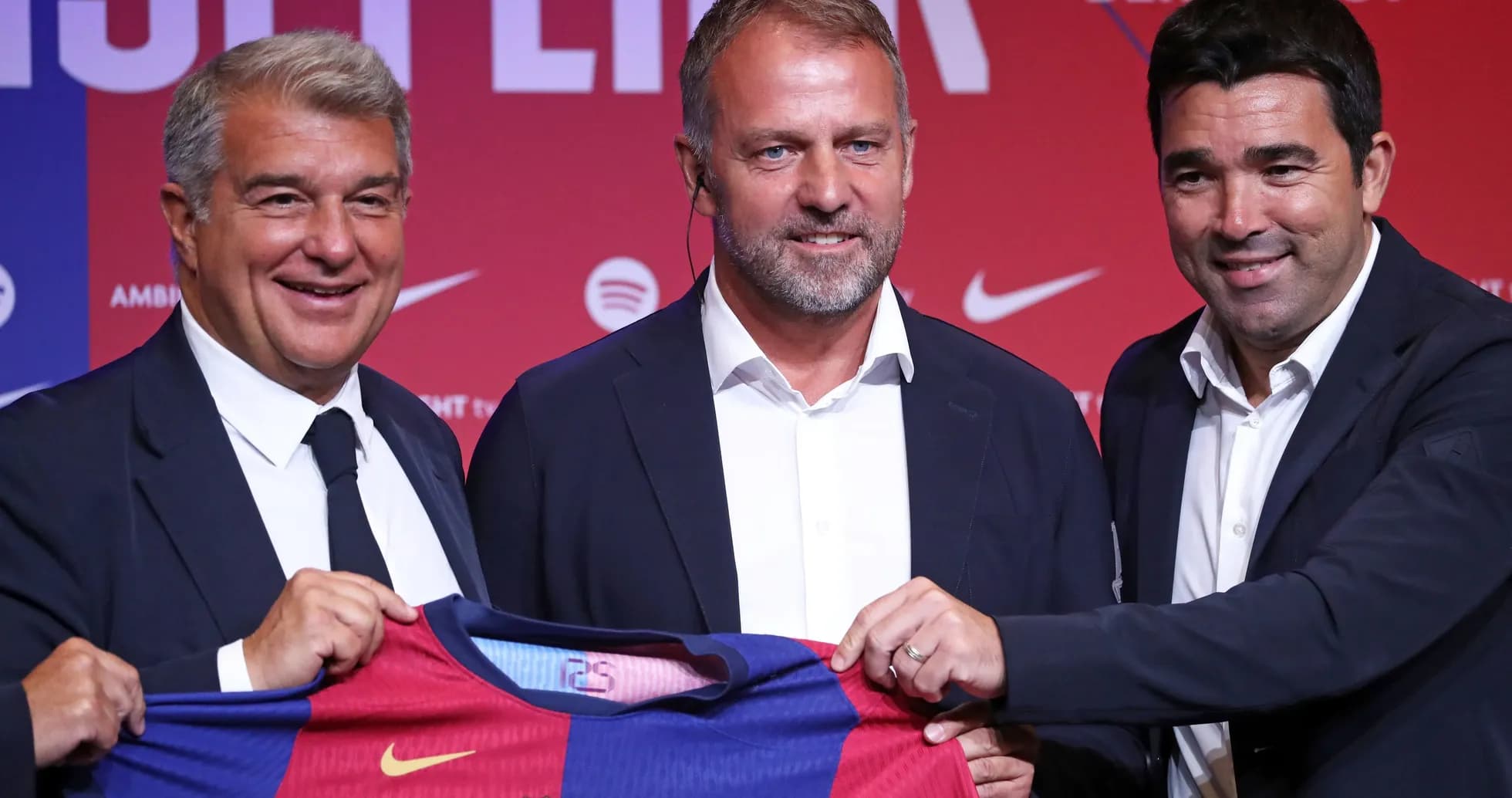 Officials presenting new FC Barcelona jersey at event Officials presenting new FC Barcelona jersey at event