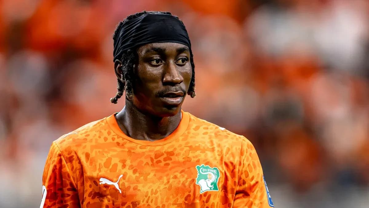 Goalkeeper wearing orange jersey during match Goalkeeper wearing orange jersey during match