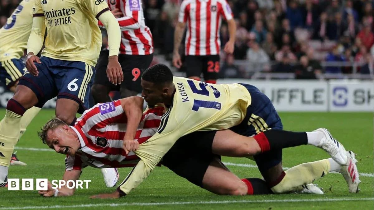 Players battling for possession during a football match Players battling for possession during a football match