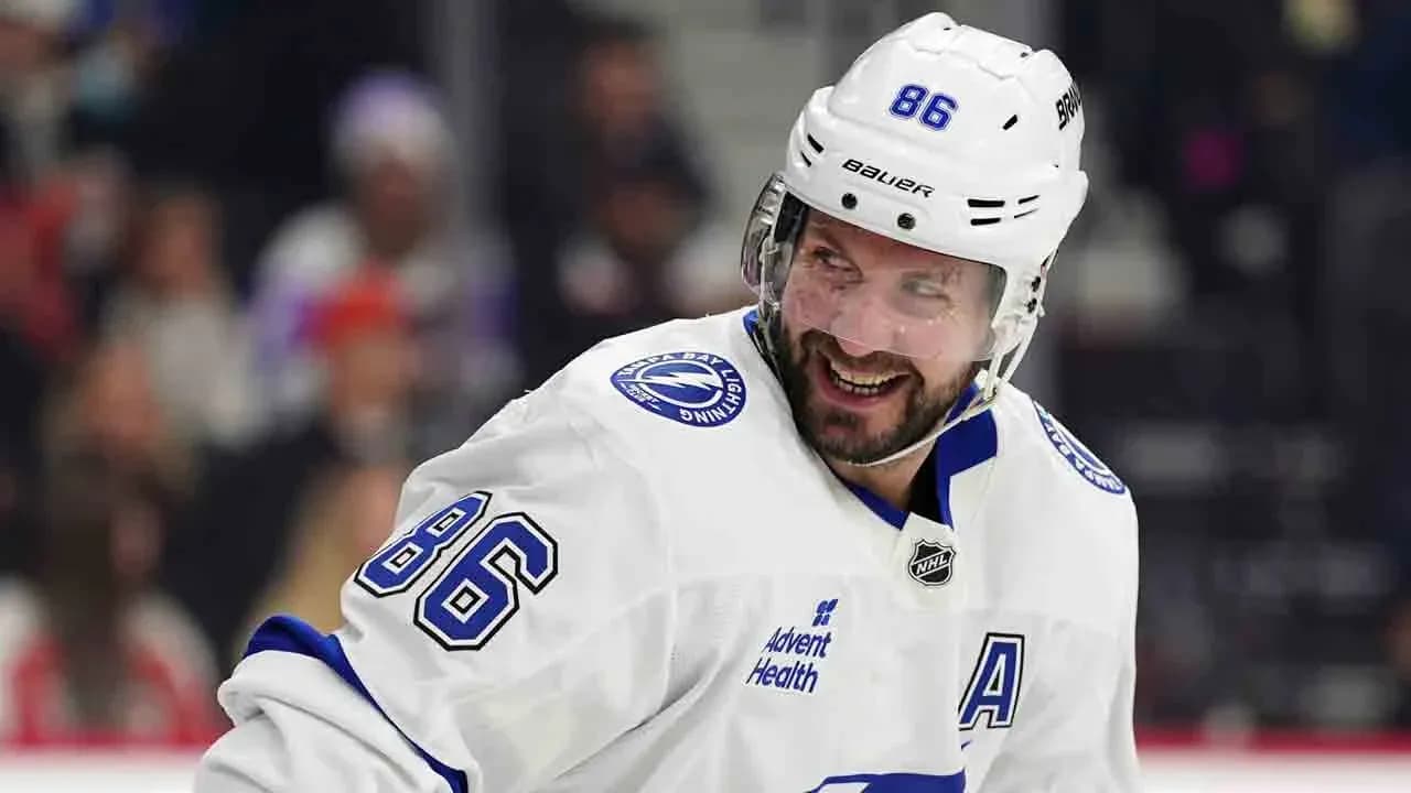 Hockey player smiling during game on ice Hockey player smiling during game on ice