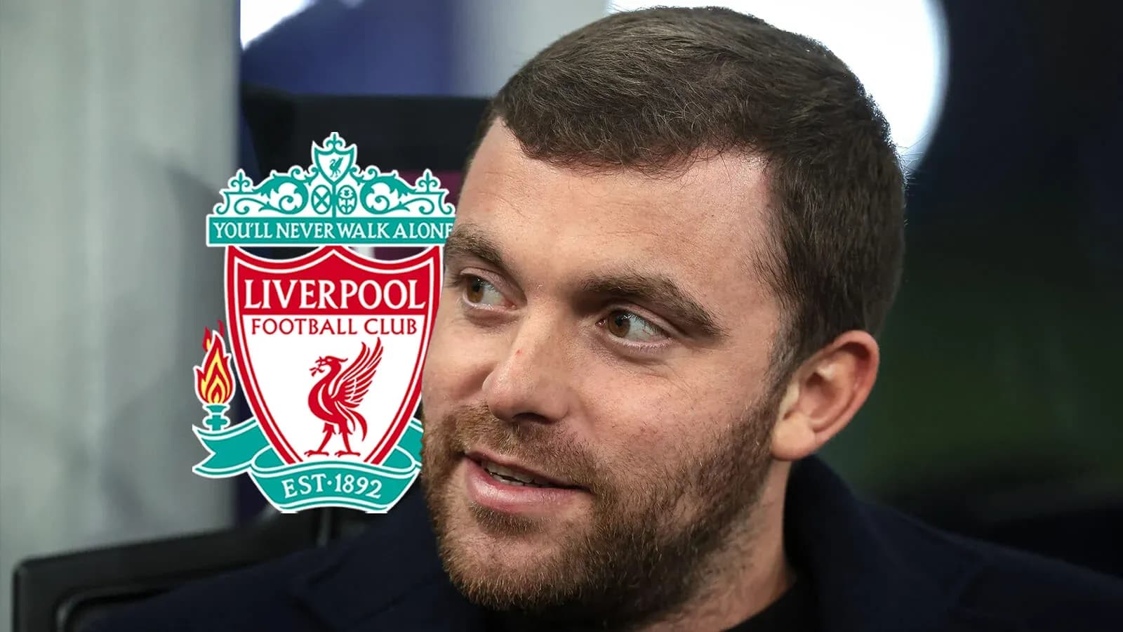 Person with Liverpool FC logo in background Person with Liverpool FC logo in background