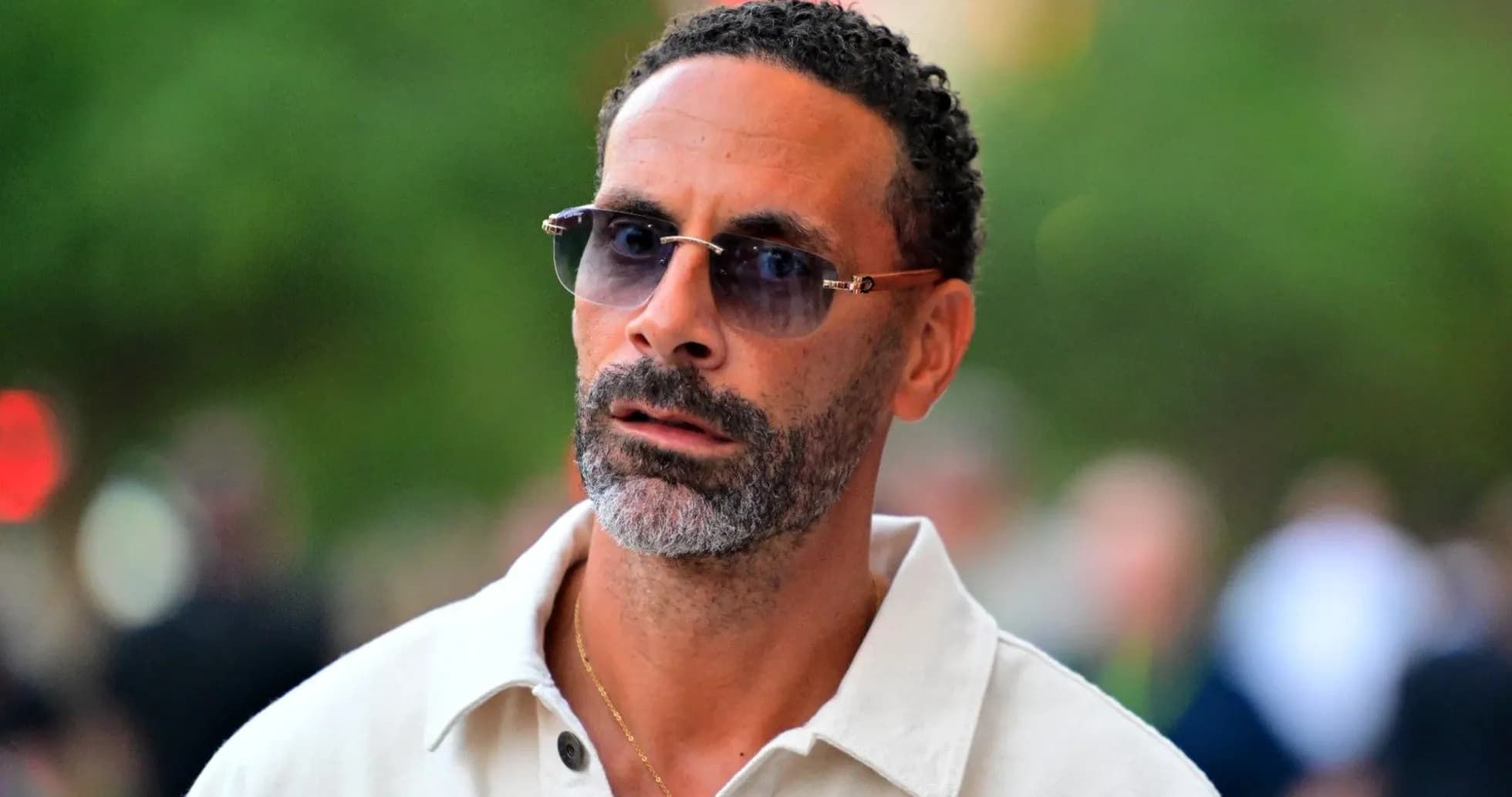 Man wearing sunglasses and a light shirt Man wearing sunglasses and a light shirt