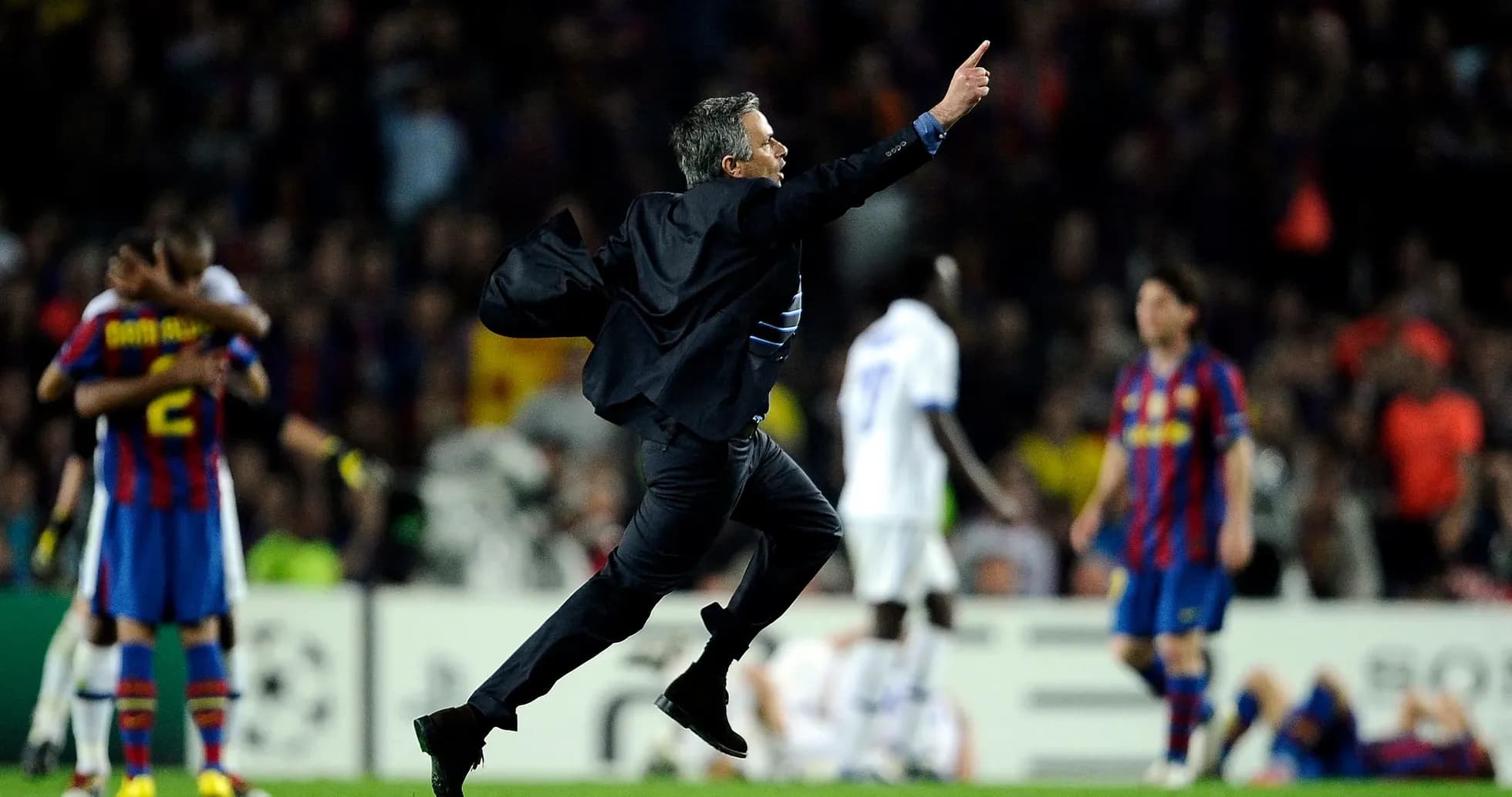 Mourinho celebrating a goal during a match Mourinho celebrating a goal during a match