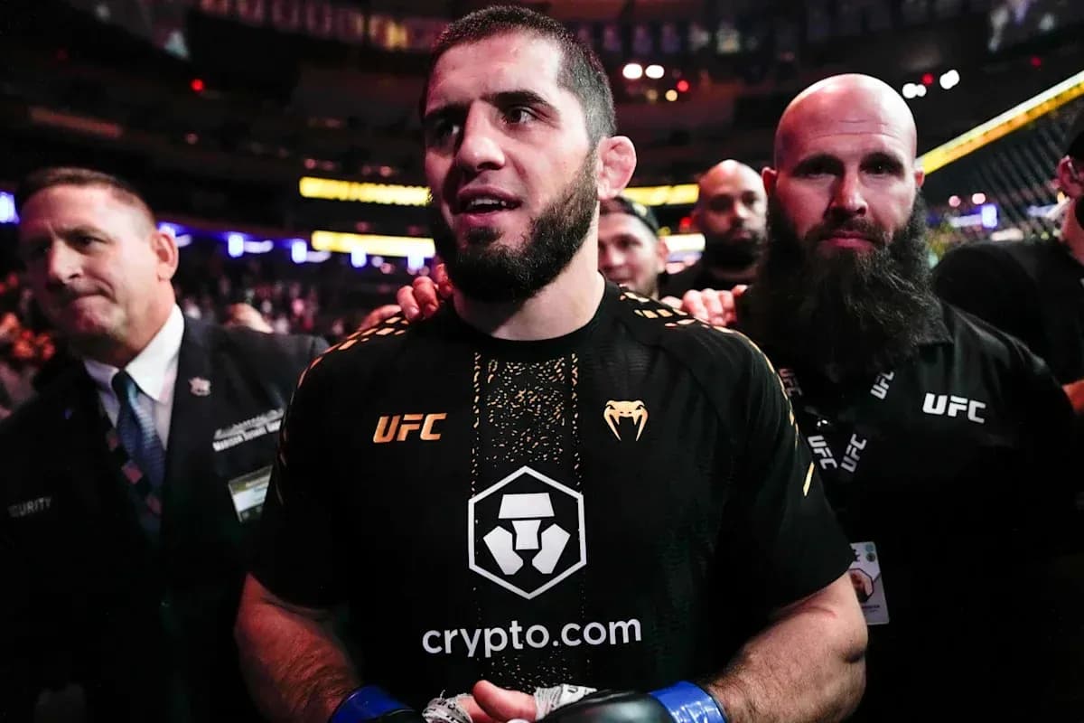 MMA fighter entering the arena surrounded by team MMA fighter entering the arena surrounded by team